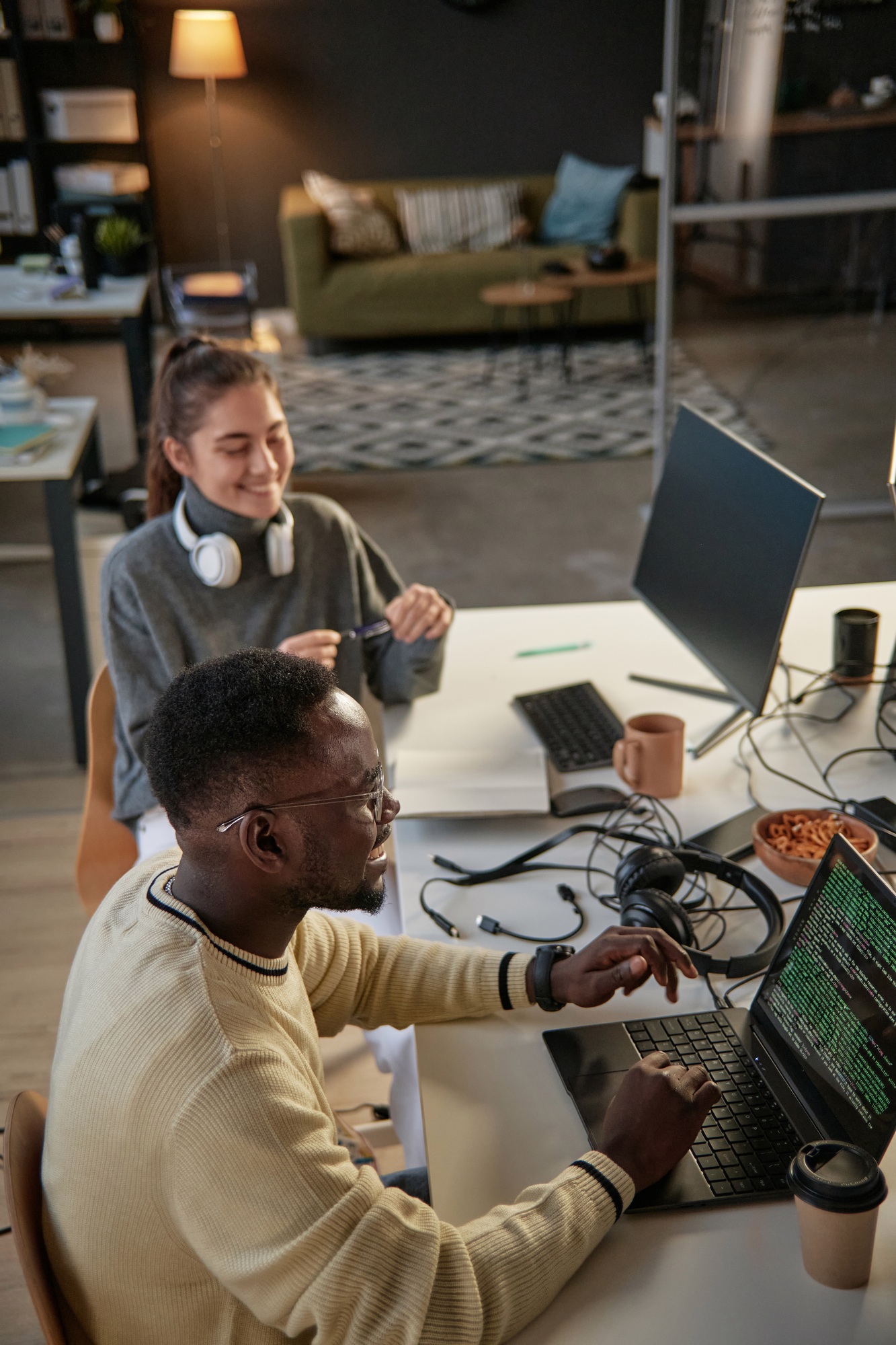 Cheerful Developers Working on Project