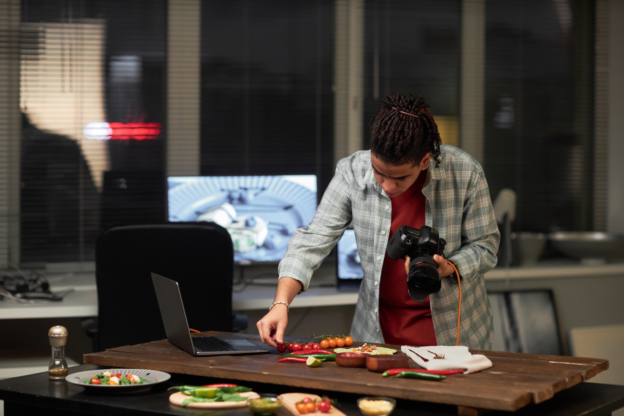 Photographer photographing food in studio